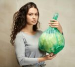 Photo by Julia M Cameron: https://www.pexels.com/photo/a-woman-holding-green-plastic-bag-6995450/