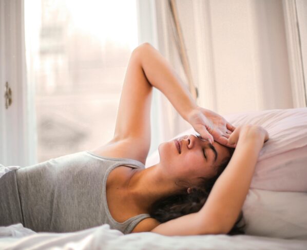 Photo by Andrea Piacquadio: https://www.pexels.com/photo/woman-in-gray-tank-top-lying-on-bed-3768582/