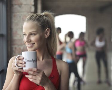 Photo by Andrea Piacquadio: https://www.pexels.com/photo/woman-wearing-red-tank-top-holding-white-ceramic-mug-863935/