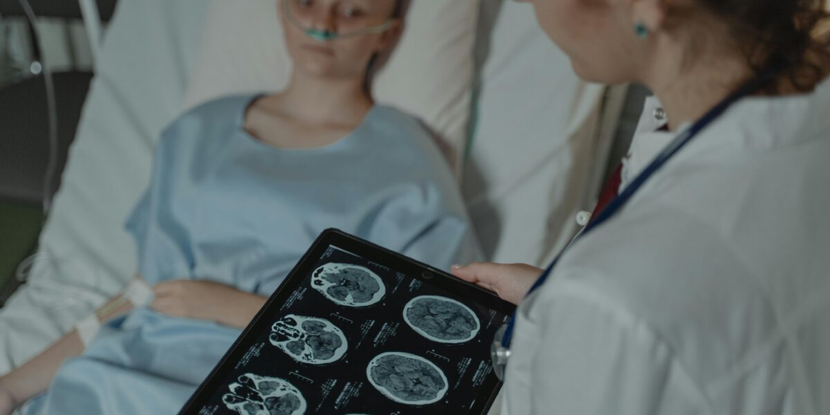 Photo by Tima Miroshnichenko: https://www.pexels.com/photo/doctor-looking-at-ct-scan-result-6011602/