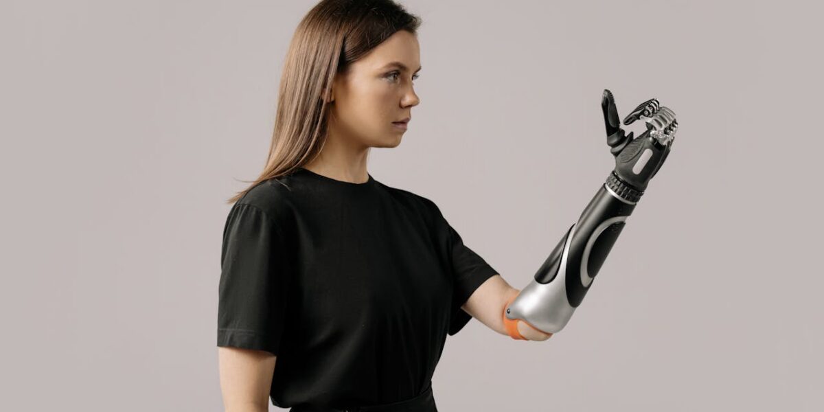 Photo by cottonbro studio: https://www.pexels.com/photo/a-woman-with-a-prosthetic-arm-6153070/