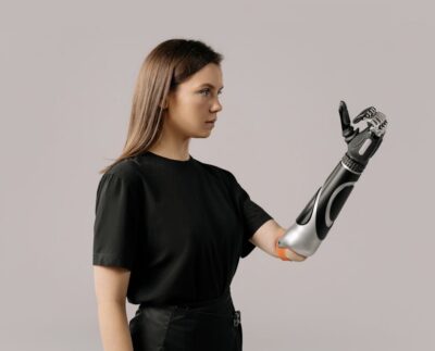 Photo by cottonbro studio: https://www.pexels.com/photo/a-woman-with-a-prosthetic-arm-6153070/