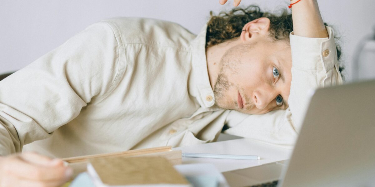 Photo by Nataliya Vaitkevich: https://www.pexels.com/photo/overworked-employee-lying-in-front-of-laptop-6837648/