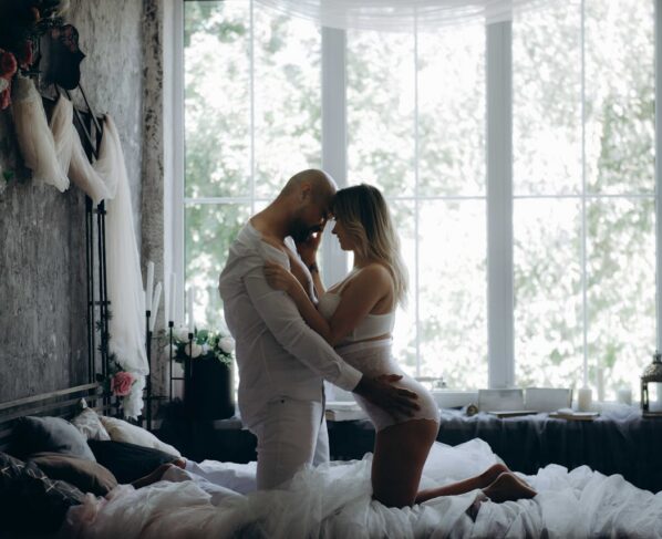 Photo by Ana Maria Moroz: https://www.pexels.com/photo/man-and-woman-kneeling-on-bed-beside-window-1700765/