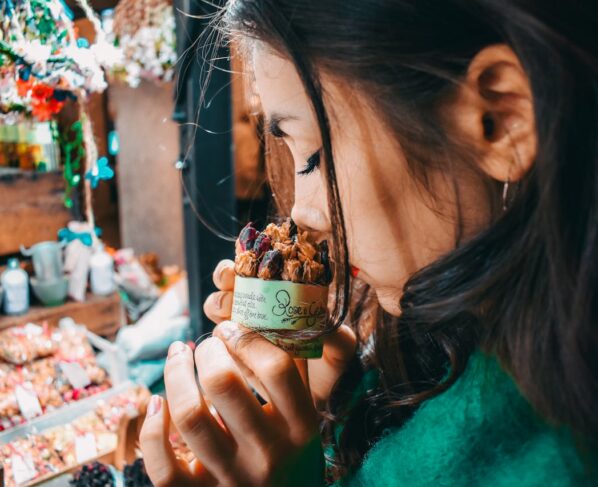 Photo by Ion Ceban @ionelceban: https://www.pexels.com/photo/woman-holding-brown-labeled-pack-2638413/