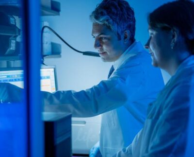Elias Sayour (left) works in the lab. UF Health, Jackie Hart