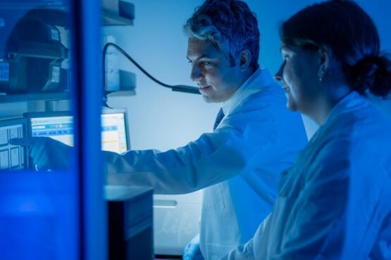 Elias Sayour (left) works in the lab. UF Health, Jackie Hart