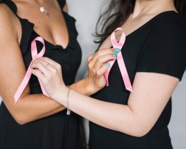 Photo by Anna Tarazevich: https://www.pexels.com/photo/2-women-holding-pink-ribbons-5482987/