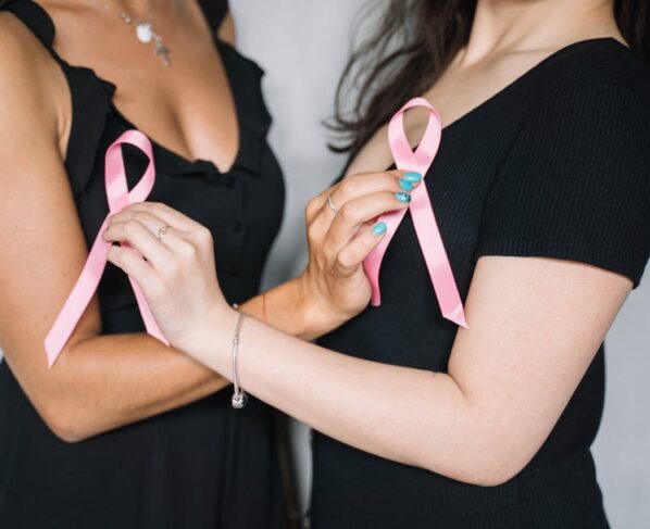 Photo by Anna Tarazevich: https://www.pexels.com/photo/2-women-holding-pink-ribbons-5482987/