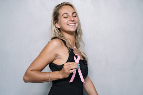 Photo by Anna Tarazevich: https://www.pexels.com/photo/woman-in-black-spaghetti-strap-top-holding-pink-ribbon-5483016/