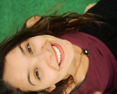 Photo by Lucas Piero: https://www.pexels.com/photo/top-view-photography-of-smiling-woman-312492/