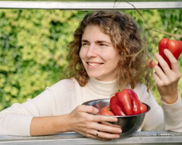 Photo by Yan Krukau: https://www.pexels.com/photo/smiling-woman-holding-a-red-bell-pepper-5479516/
