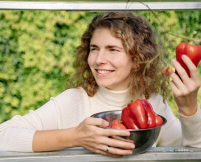 Photo by Yan Krukau: https://www.pexels.com/photo/smiling-woman-holding-a-red-bell-pepper-5479516/