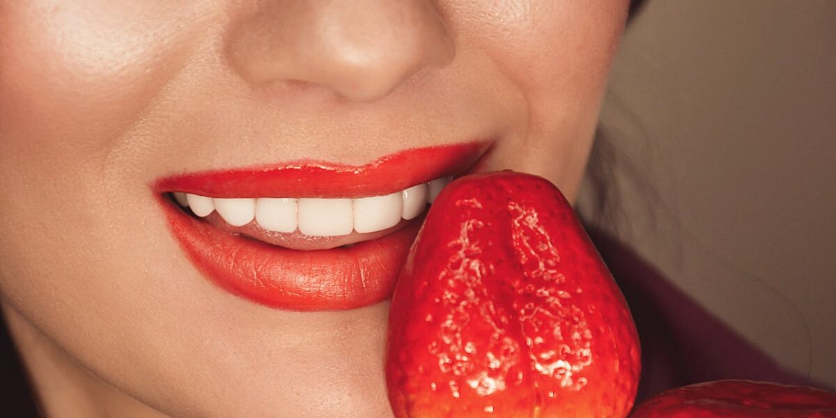 Photo by Inna Mykytas: https://www.pexels.com/photo/woman-with-red-lipstick-holding-a-strawberry-7866503/
