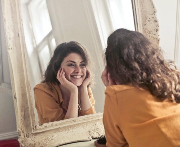 Photo by Andrea Piacquadio: https://www.pexels.com/photo/photo-of-woman-looking-at-the-mirror-774866/