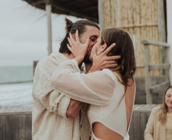 Photo by Carolina Basi: https://www.pexels.com/photo/romantic-beachfront-wedding-kiss-at-sunset-30890464/