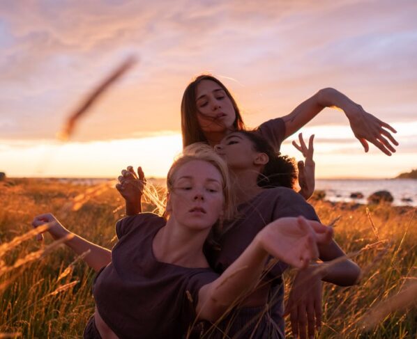Photo by cottonbro studio: https://www.pexels.com/photo/three-women-dancing-on-grass-field-during-sunrise-10570884/