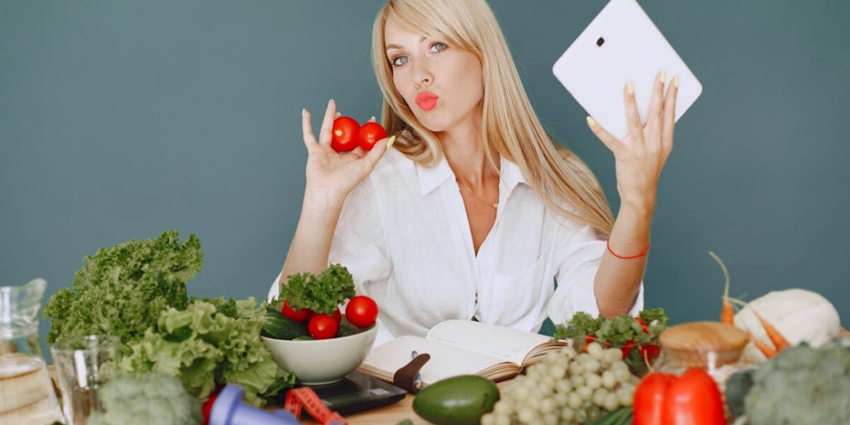 Photo by Gustavo Fring: https://www.pexels.com/photo/woman-sitting-by-a-table-full-of-vegetables-5622187/