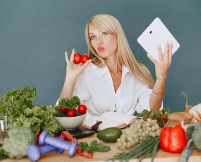 Photo by Gustavo Fring: https://www.pexels.com/photo/woman-sitting-by-a-table-full-of-vegetables-5622187/