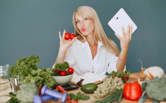 Photo by Gustavo Fring: https://www.pexels.com/photo/woman-sitting-by-a-table-full-of-vegetables-5622187/