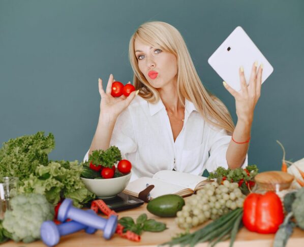 Photo by Gustavo Fring: https://www.pexels.com/photo/woman-sitting-by-a-table-full-of-vegetables-5622187/