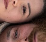 Photo by Katarína Bukerová: https://www.pexels.com/photo/intimate-close-up-of-couple-relaxing-outdoors-32529497/