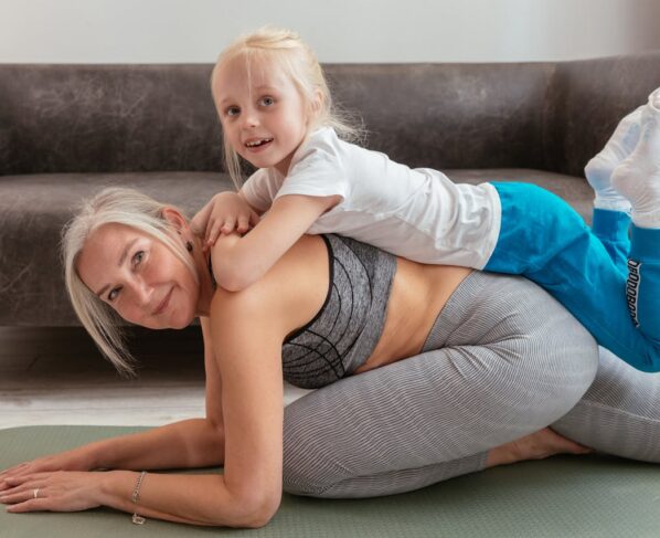 Photo by Mikhail Nilov: https://www.pexels.com/photo/a-grandmother-and-grandchild-doing-exercise-together-8307445/