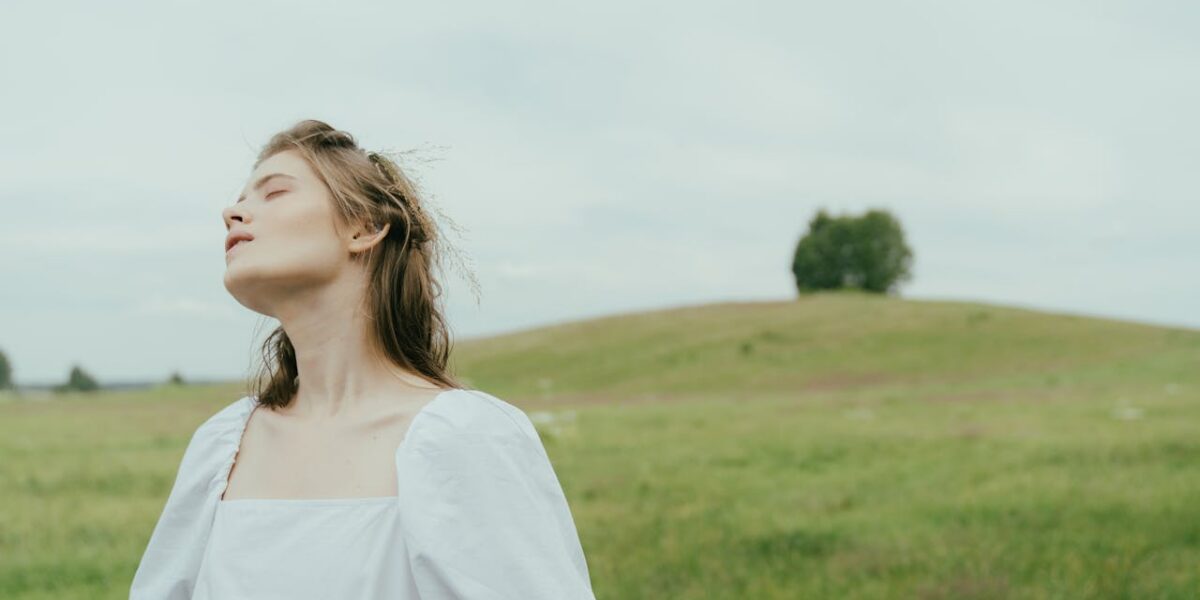 Photo by cottonbro studio: https://www.pexels.com/photo/portrait-of-a-woman-at-the-meadow-5615688/