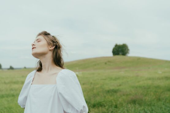 Photo by cottonbro studio: https://www.pexels.com/photo/portrait-of-a-woman-at-the-meadow-5615688/