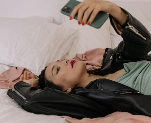 Photo by cottonbro studio: https://www.pexels.com/photo/woman-looking-at-cellphone-6965102/