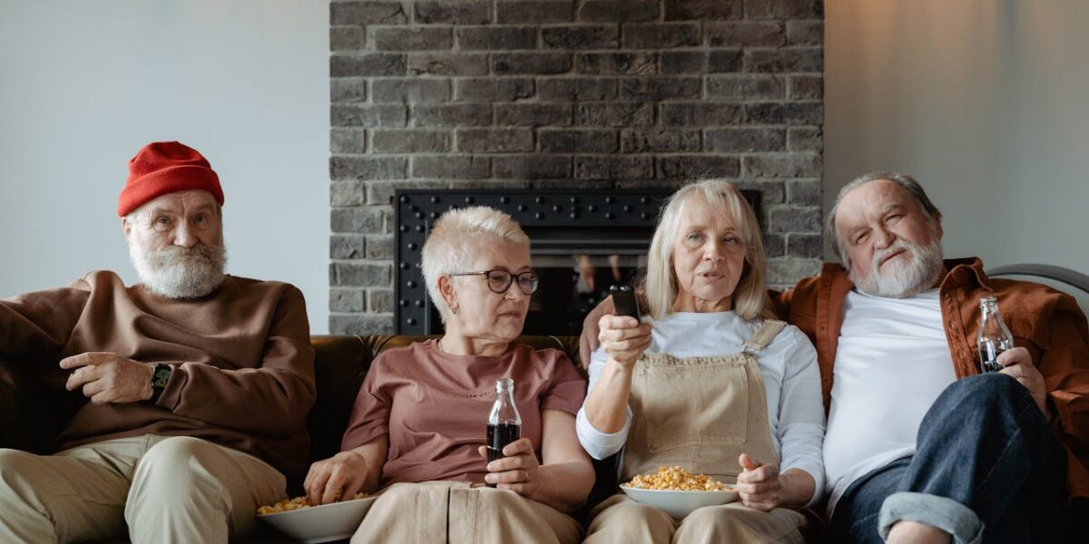 Photo by MART PRODUCTION: https://www.pexels.com/photo/people-sitting-on-a-couch-7329702/