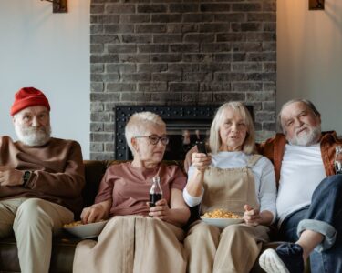Photo by MART PRODUCTION: https://www.pexels.com/photo/people-sitting-on-a-couch-7329702/
