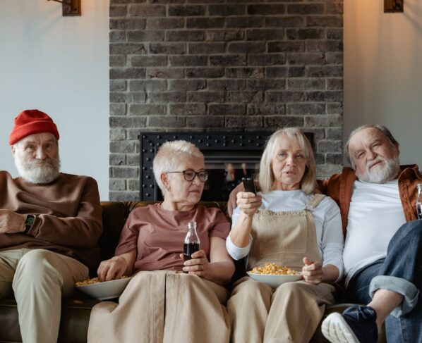 Photo by MART PRODUCTION: https://www.pexels.com/photo/people-sitting-on-a-couch-7329702/